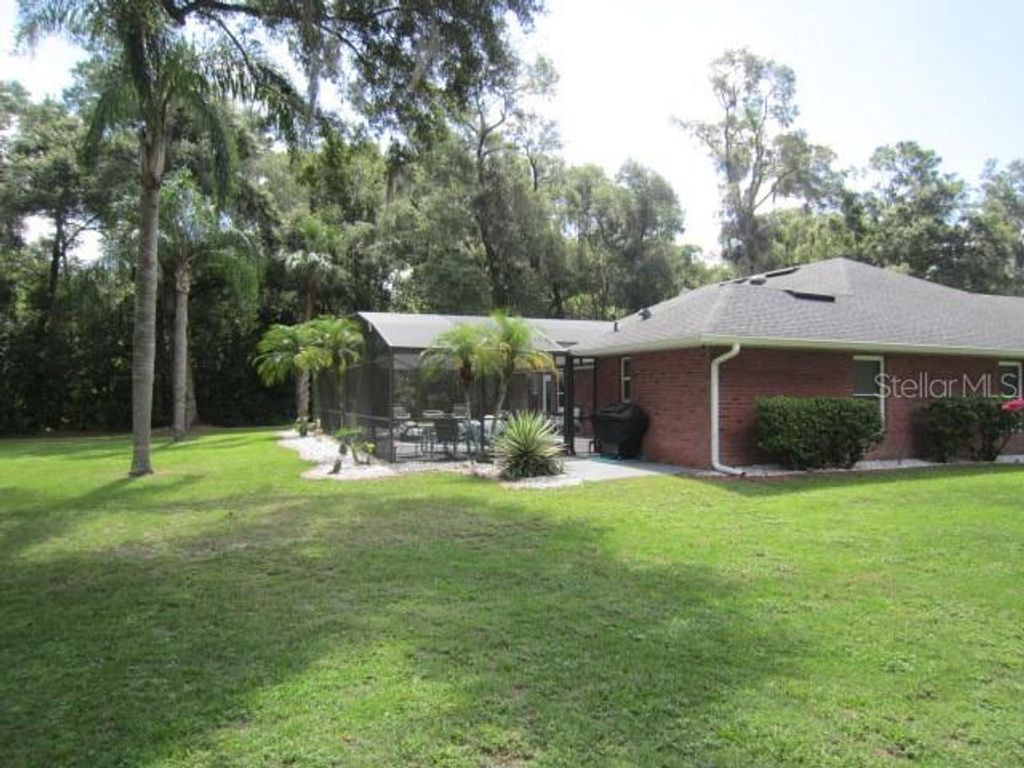 Photo of 975 Rolling Acres Drive, Deland, FL 32720 (MLS # V4944432)