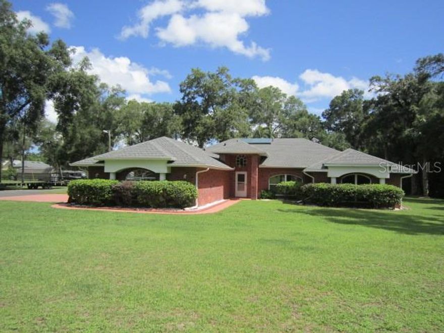 TOTAL OF 6535 SQ FT BEAUTIFUL HOME HAS IT ALL.. 4 BEDROOMS 3 BATHS 3 CAR ATTACHED GARAGE OVER SIZED SCREENED IN SOLAR HEATED POOL WITH JACUZZI AND CARETAKER SYSTEM. KITCHEN HAS UPGRADED CABINETS ALL NEW HIGH END APPLIANCES INSTALLED THIS YEAR 2 PANTRIES AND SKYLIGHT. ENGINEERED HARD WOOD AND TILE FLOORS THRU OUT. LARGE MASTER WITH 2 WALK IN CLOSETS DUAL VANITIES JACUZZI TUB SEPARATE SHOWER 2ND BEDROOM HAS WALK IN CLOSET AND SIDING GLASS DOOR LEADING TO THE SCREENED IN POOL AND A PRIVATE POOL BATH. KITCHEN AND FAMILY ROOM COMBO WITH GAS FIREPLACE LIVING ROOM AND DINING ROOM AREA AND OFFICE. LAUNDRY ROOM INSIDE HOME SITS ON ALMOST 5 ACRES OF PROPERTY WHICH IS FENCED AND CROSSED FENCED FOR HORSES. 5 STALL BARN 1200 SQ FEET WITH SELF WATERS AND FANS ALONG WITH A CHICKEN COOP. THERE IS A MASSIVE METAL SHOP 50 X 80 4000 SQ FEET PERFECT FOR THE CAR COLLECTOR OR TO JUST STORE YOUR FAVORITE TOYS. 12 X 30 WORKSHOP/STORAGE BUILDING WITH POWER 5 KW SOLAR SYSTEM INSTALLED ON ROOF OF METAL SHOP TO REDUCE THE ENERGY BILL ON YOUR HOME 2 WELL PUMPS ONE FOR IRRIGATION BARN AND SHOP ONE FOR HOME.BOTH WELL PUMPS WERE REPLACED IN 2023 ROOF WAS REPLACED IN 2021 AC IN 2016 . HOME ALSO OFFERS A SOLAR WATER HEATER PROPERTY IS BEAUTIFULLY LANDSCAPED AND GATED FOR PRIVACY THIS PROPERTY IS YOUR OWN PRIVATE OASIS WITH EVERYTHING SOME ONE COULD WANT BUT CLOSE TO ALL MAJOR SHOPPING 25 MINUTES TO BEACHES AND 45 MINUTES TO ATTRACTIONS. THIS PROPERTY IS ONE OF A KIND AND HARD TO FIND CALL NOW FOR YOUR PRIVATE SHOWING!!! SELLER IS A LICENSED REAL ESTATE AGENT