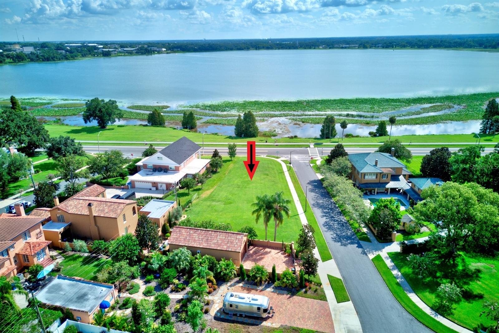 Rare Opportunity to Purchase a Vacant Lot on Lake Hollingsworth Dr. Build your Dream Home and Enjoy Spectacular Lake Views Forever! The Homesite Offers .4 Acre and Sits on the Corner of Lake Hollingsworth Dr. and Minnehaha Trl. Within Walking Distance of the Lakeland Country Club. Enjoy Quiet Walks Around Lake Hollingsworth, Central Lakeland Living at its Finest and Close to Everything Lakeland has to Offer! Lake Morton Home of the Famous Lakeland Swans is just a Short Bike Ride away. Lakeland Offers A Vibrant Downtown, Saturday Downtown Farmer’s Market, Lakeside Village, Many Shops & Restaurants, Florida Southern College, AGB Museum of Art, Community Theatre, Broadway Shows, Concerts and more! Lakeland also Offers many Outdoor Activities to include Multiple Hiking & Biking Trails, Golf, Lakes, Tennis & Pickleball. Be sure to check out Lakeland’s Newest Outdoor Venue – Bonnett Springs Park! Lakeland Airport Now Offering Commercial Flights to Multiple Cities. Listing Agent Can Assist with Reputable Builder and Building Plans if Needed.