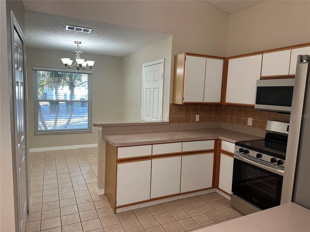 Photo of 13652 Glasser Avenue, Orlando, FL 32826 (MLS # O6378152)