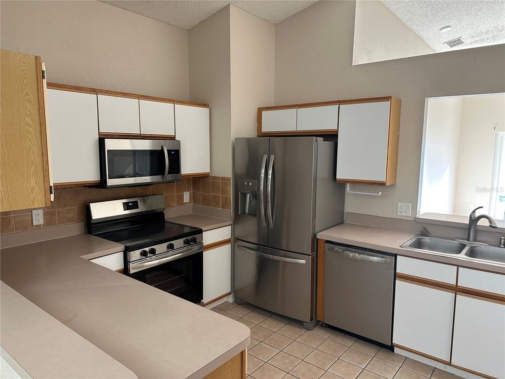 Photo of 13652 Glasser Avenue, Orlando, FL 32826 (MLS # O6378152)