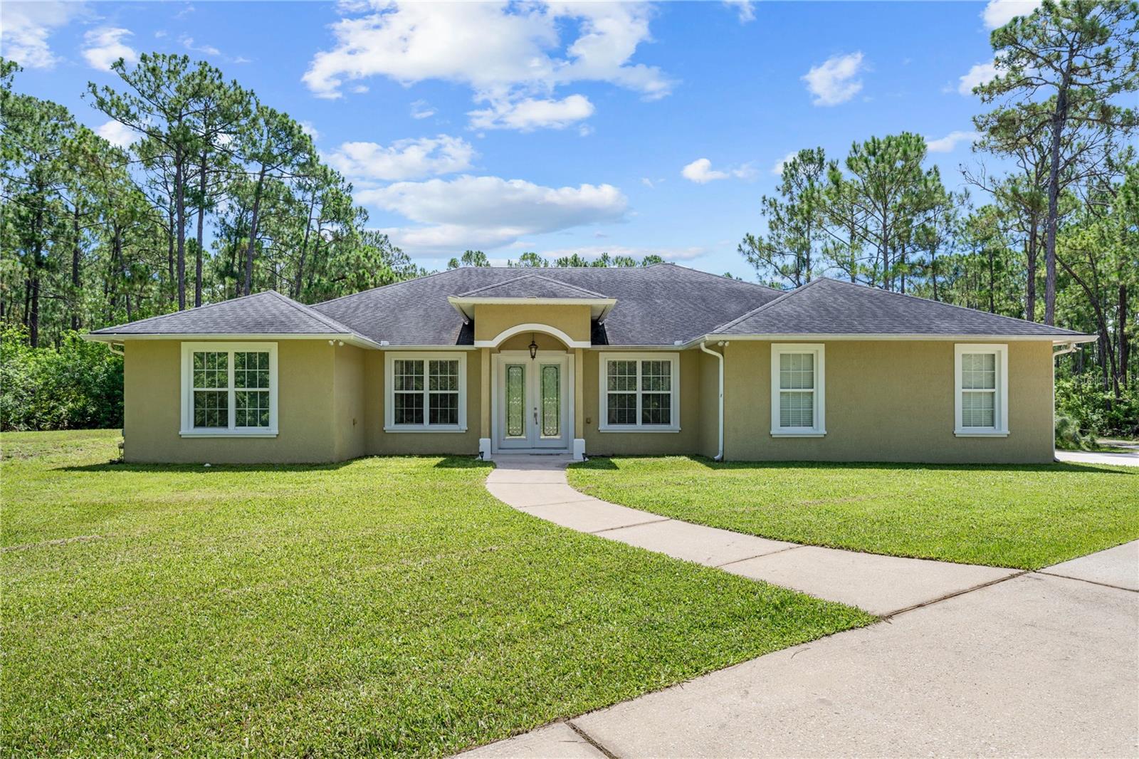 Welcome Home to this Unique Sportsman's Paradise. A Country Home with Upgrades Galore. Perfectly situated away from it all yet still close to the Beaches, Airport, town and especially the water. This amazing 4BR/3BA home sits on 5 acres of beautiful property boasting 2 ponds for fishing, a huge workshop out back with roller doors big enough for RV's, Boats and 4 Wheelers, you choose! Rocket Launches from Cape Canaveral create amazing views to be enjoyed as well. The home was built and has been meticulously maintained by the original owners. The wooded exterior of the property gives ultimate privacy and tranquility for living your best lifestyle. The gated community of Lake Harney Woods offers a shared private boat ramp for all of its residents to enjoy which drops you into Lake Harney which is part of the St. John's River system. The desirable schools for the subdivision are Geneva Elem., Lawton Chiles Middle and Oviedo High in Seminole County. Come and see this rare gem today!
All information in this listing is deemed accurate but should be independently verified by the buyer and it's agent. Thanks!