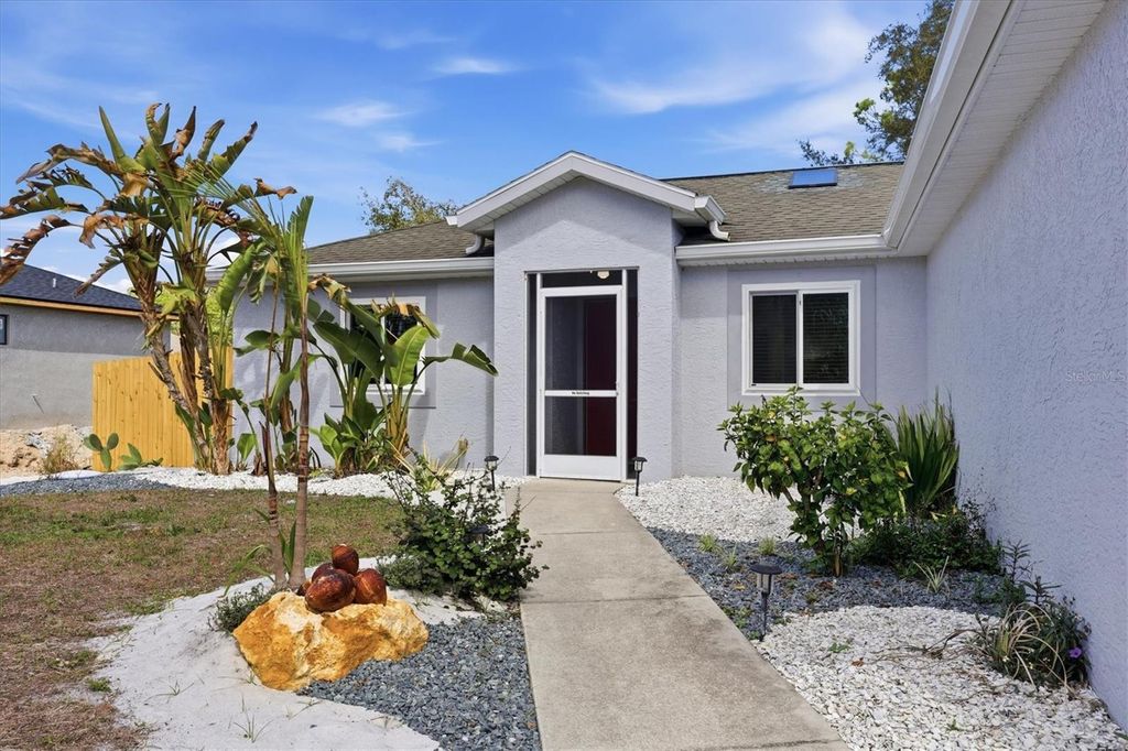 Photo of 545 Lomond Drive, Port Charlotte, FL 33953 (MLS # A4685443)