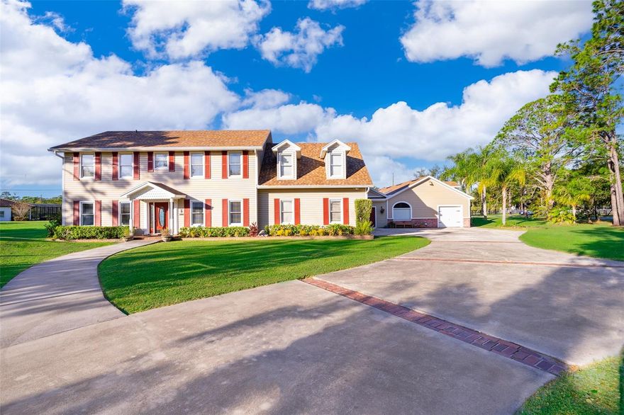 Welcome to a truly unique and captivating property that offers a "TWO-FER" deal, providing not one but two complete residences in one spectacular package! This exceptional estate presents a harmonious blend of Colonial-inspired architecture and modern luxury, offering an array of amenities that cater to diverse lifestyles.


The main 2-story home exudes timeless charm with its Colonial architectural influences, boasting 4 spacious bedrooms and 2 elegantly appointed bathrooms on the upper level. The lower
 level is designed for both comfort and entertainment, featuring a generous eat-in kitchen, a formal dining room for hosting memorable gatherings, a cozy living room, and a family room with a fireplace that adds warmth and character to the space. An additional
 full bathroom and a versatile bonus room complete the lower level, offering endless possibilities for customization to suit your preferences.


What makes this property truly exceptional is the inclusion of a 1-bedroom, 1-bathroom in-law suite that is not only convenient but also wheelchair-accessible. This suite overlooks
 a beautiful courtyard with a refreshing pool, a welcoming patio area, and a chef-inspired summer kitchen, making it the perfect setting for outdoor leisure and entertaining.


For those with a penchant for cars or recreational vehicles, the property boasts a combined total of 4 garage spaces, ensuring ample room for storage and protection of your vehicles.
 The extended motor court provides additional parking space for your family, guests, and enthusiastic party-goers, ensuring that you never have to compromise on space.


The home has recently received a significant update with a brand-new roof installed in October 2023, providing peace of mind and added value to the property. The pool and patio area
 underwent extensive upgrades and renovations in 2020, enhancing the overall outdoor experience. With three fully equipped kitchens at your disposal, this property is a dream come true for those who love to entertain and host gatherings of all sizes.


Situated on a sprawling 1.47-acre lot zoned RCE (yes, you can even have a horse!), this home offers a tranquil and private retreat while maintaining excellent proximity to amenities.
 Enjoy easy access to the prestigious Rio Pinar Country Club, the Orlando International Airport, and all the attractions of Central Florida via the nearby 408 and 417 Expressways. For those seeking sun and sand, Florida's East Coast beaches and Cruiseport are
 easily accessible via the 528 Beachline.


This remarkable property is not just a home; it's a lifestyle. Take the opportunity to explore the attachments for additional information and "fun facts" about this extraordinary
 house and its expansive grounds. This is a rare chance to own a property that combines classic elegance with modern convenience and is tailor-made for those who appreciate the finer things in life. Don't miss out on making this one-of-a-kind estate your own!