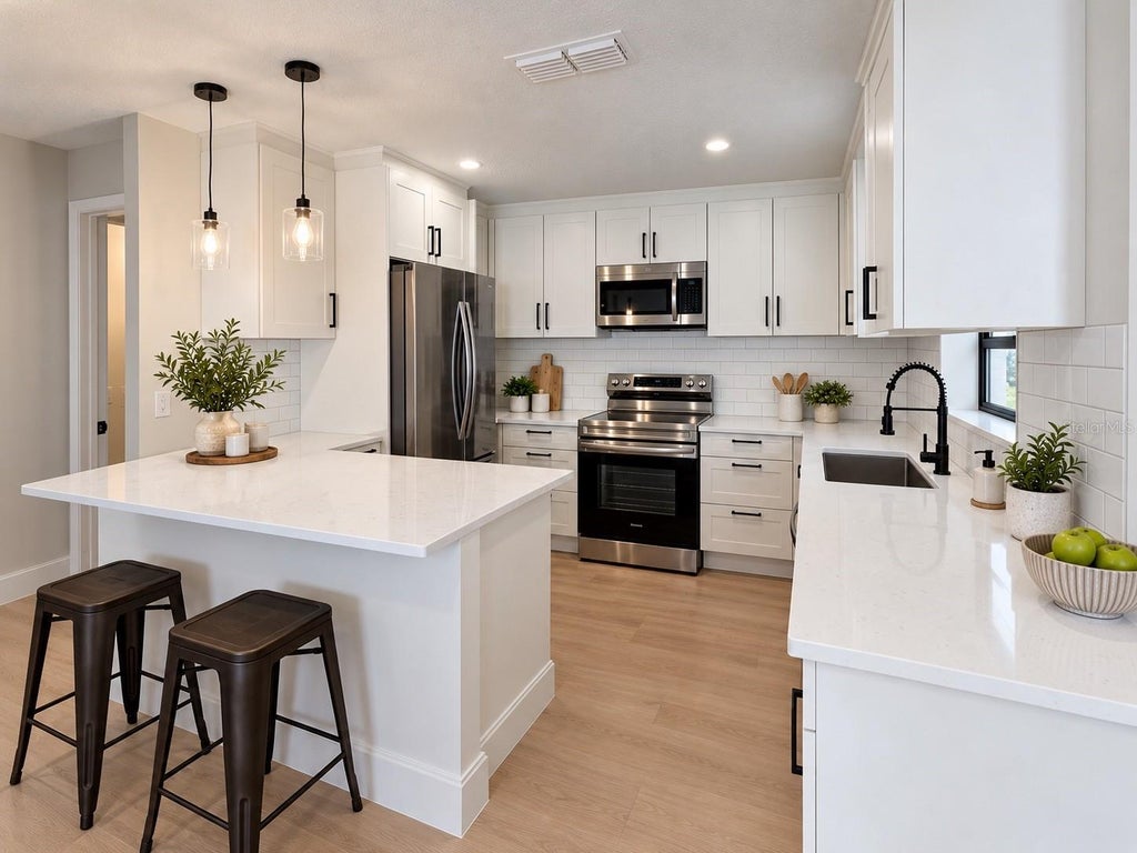 Photo of 3455 Jujube Drive, Orlando, FL 32810 (MLS # O6450383)