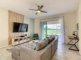 Spacious 2-bedroom condo in Champions Gate with private patio and resort access. The property includes a master bedroom with king-size bed and en-suite bathroom, a Disney-themed bedroom with bunk bed, a fully equipped kitchen, dining area, and living room with sofa bed. Features include Smart TVs, free high-speed internet, washer/dryer, and game room with console.
Residents and guests enjoy access to resort-style amenities: clubhouse, gym, heated pools, lazy river, splash pad, water slides, volleyball, tennis, cinema, arcade, and on-site dining. Located just 14–22 miles from Disney, Universal, and SeaWorld, with shopping, dining, and golf courses nearby. Minimum rental term: 1 month. No smoking and no pets allowed.