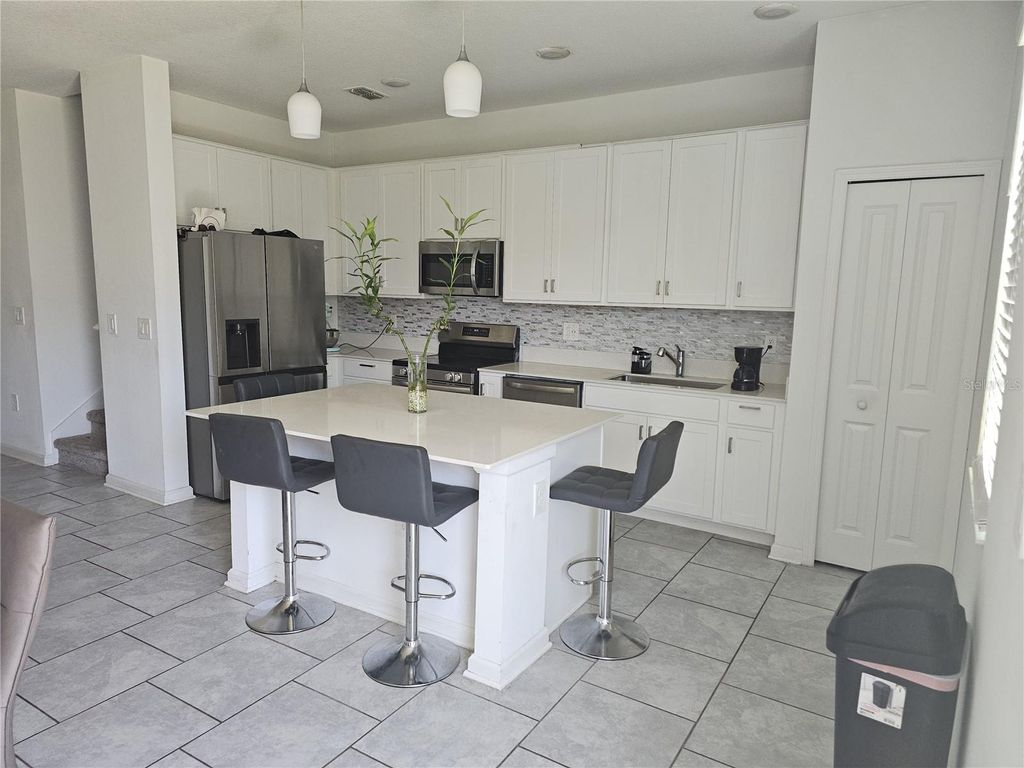Photo of 3166 Laurent Loop, Davenport, FL 33837 (MLS # TB8500629)
