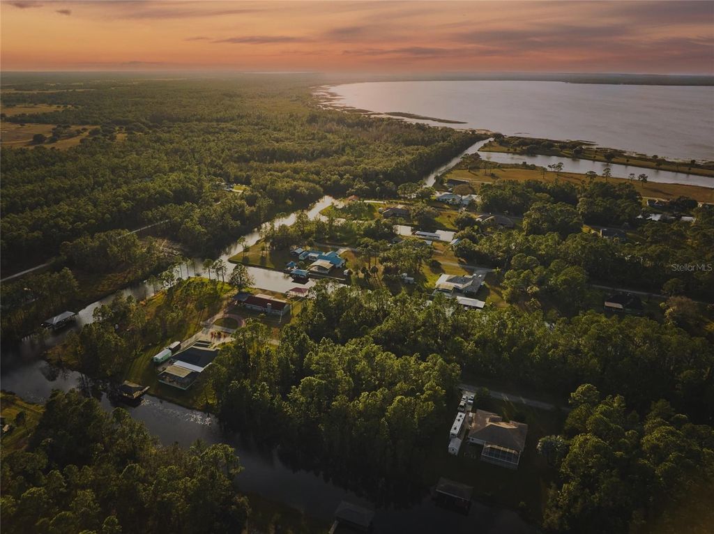 Photo of 28 Amaryllis Drive, Indian Lake Estates, FL 33855 (MLS # TB8467412)