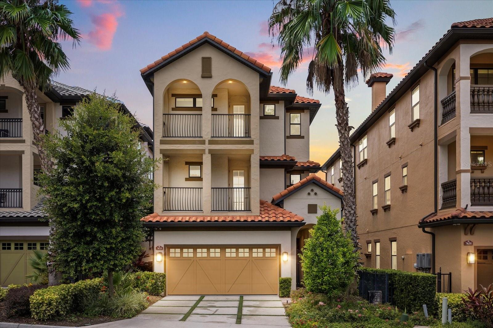 Welcome to the prestigious Toscana community, a sought-after gated enclave in the heart of Orlando. This luxurious three-story single-family home boasts four bedrooms, 4.5 baths and a private elevator for easy access to all levels. Designed with charm, the residence offers breathtaking infinity pool with ideal views of Spring Lake from multiple balconies, facing Disney fireworks every night at 9 p.m. Residents of Toscana enjoy upscale amenities, including a resort-style pool in a beautifully landscaped setting. The home provides a blend of comfort and convenience, with expansive living spaces, and an open-concept design for relaxation and entertainment. Just minutes from Restaurant Row, Universal Studios and Icon Park, Toscana provides easy access to world-class dining, entertainment and shopping. Its central location near major highways makes commuting effortless while offering a serene retreat from the city's hustle and bustle.