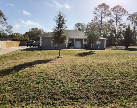 Photo of 551 NE 61st Terrace, Ocala, FL 34470 (MLS # OM720097)