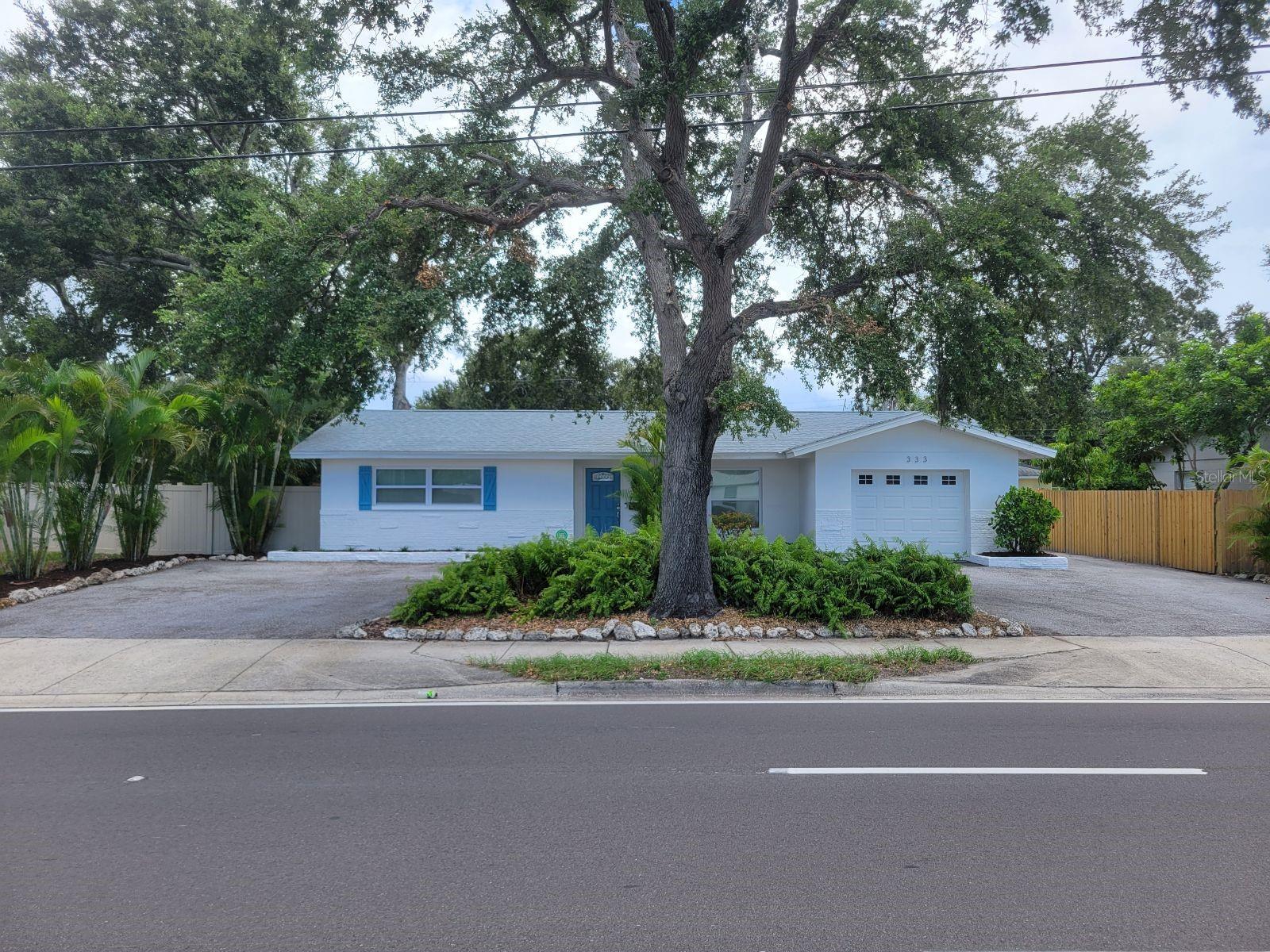***AMAZING RETREAT-STYLED HOME***
Nicely located in Causeway Isles just off of the Treasure Island Causeway stands this stunning private paradise home featuring three bedrooms, two bathrooms, a nicely sized 1301 square feet of living space, numerous updates, an one-car garage, and a gorgeous back patio with a heated pool, waterfall, bar/kitchen area, and a putting green. Offered fully furnished, this amazing property offers a large living room/dining room space artfully decorated in the widely popular coastal style. The modern kitchen has bright white appliances and cabinetry, plus granite countertops and lots of storage. There is a queen-sized bed in the master bedroom for you to stretch out and the bathrooms showcase beautiful, yet functional tile work plus modern fixtures. The other beautiful bedrooms offer comfortable beds and luxury linens. Experience Florida at this finest just out back to your extraordinary private, retreat style backyard area. This phenomenal space has several places to relax…on the comfortable furniture watching your favorite game, entertaining at the bar or grilling on the side patio, practicing your swing on the putting green, or just floating around in the pool. The ultimate in relaxing or entertaining family or friends. Boaters love this location as it has easy access to John’s Pass, Blind Pass, and the Pass-a-Grille Channel. You will have easy and quick access to the beautiful Treasure Island Beach and a short drive to the nightlife and amazing Downtown St Pete featuring the new Pier. If you choose to bike in the area, you are close to the Pinellas Trail, or the surrounding neighborhood and beaches are great to take a bike riding adventure! Pets will need approval. ONE MONTH MINIMUM LEASE PERIOD. $3495 is the rent price for months of April – September and $7200 is the price for the months of October – March. All utilities are included except the 18% local taxes. Contact us right now to find out more about this exclusive rental opportunity!