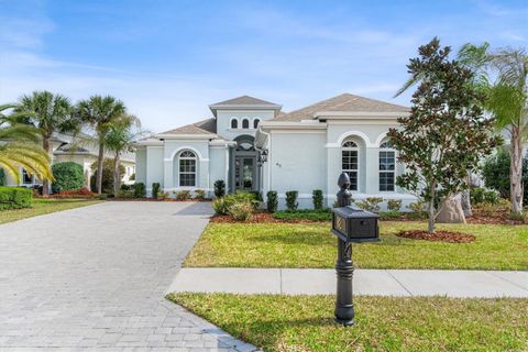 Photo of 82 N Lakewalk Drive, Palm Coast, FL 32137 (MLS # FC316511)
