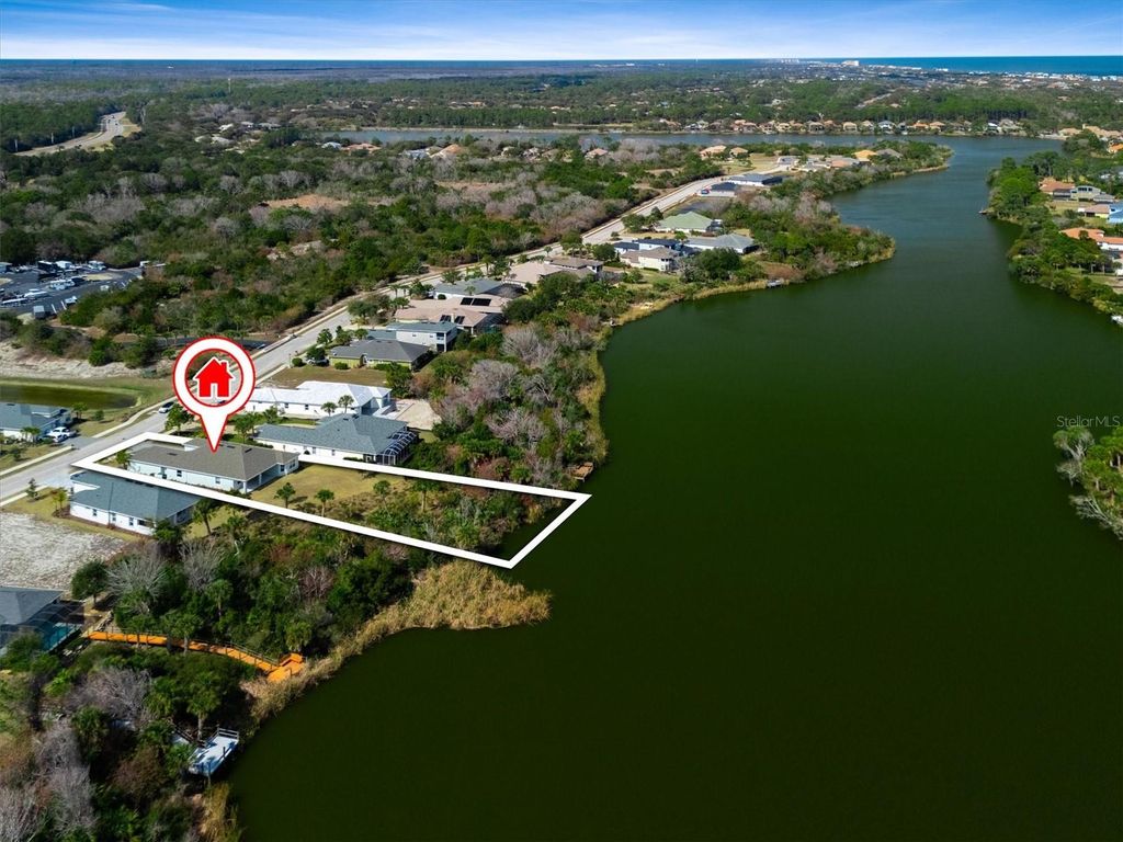Photo of 82 N Lakewalk Drive, Palm Coast, FL 32137 (MLS # FC316511)