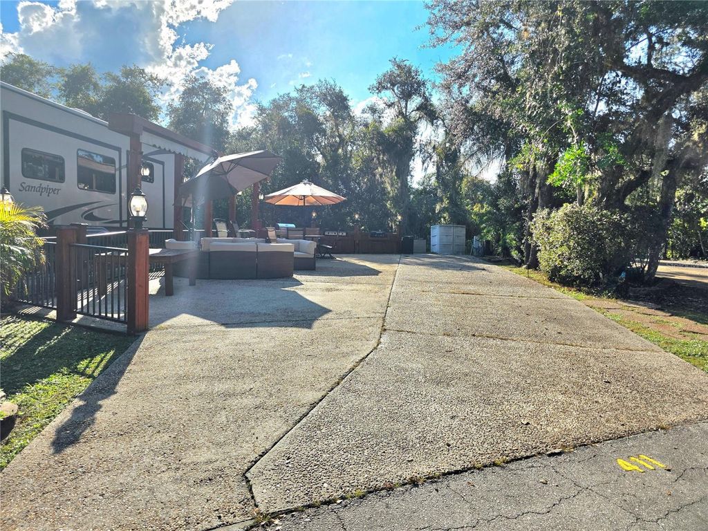 Photo of 411 Longhorn Drive, Lake Wales, FL 33853 (MLS # P4936775)