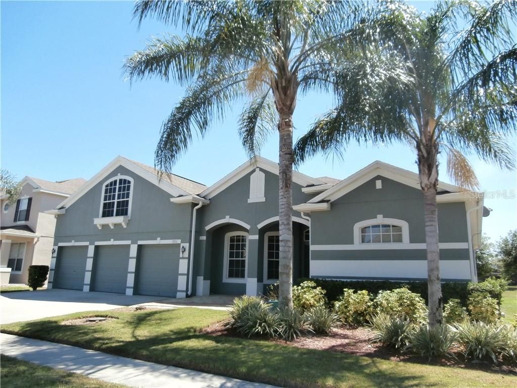 Photo of 7251 Winding Lake Circle, Oviedo, FL 32765 (MLS # O6376923)