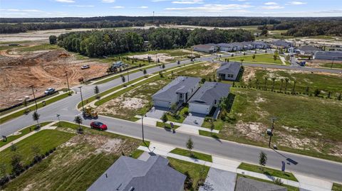 Tiny photo for 574 Hammock Oaks Boulevard, Lady Lake, FL 32159 (MLS # W7884331)