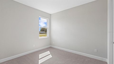 Tiny photo for 574 Hammock Oaks Boulevard, Lady Lake, FL 32159 (MLS # W7884331)