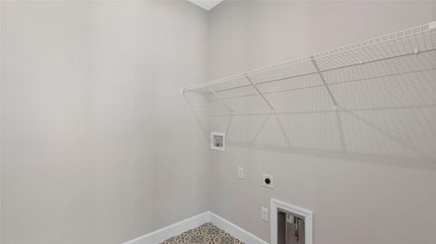 Tiny photo for 574 Hammock Oaks Boulevard, Lady Lake, FL 32159 (MLS # W7884331)