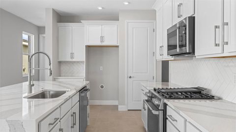 Tiny photo for 574 Hammock Oaks Boulevard, Lady Lake, FL 32159 (MLS # W7884331)