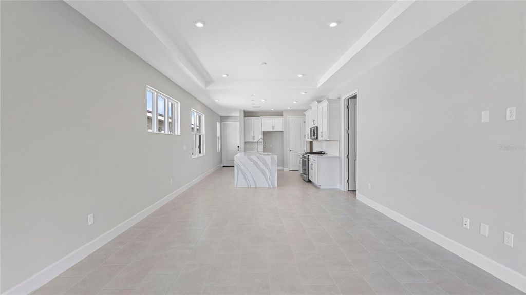 Photo of 574 Hammock Oaks Boulevard, Lady Lake, FL 32159 (MLS # W7884331)