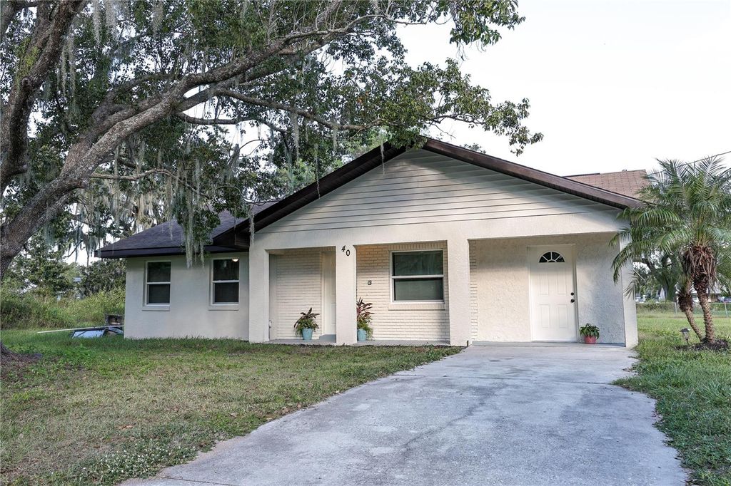 Photo of 40 N Bloxham Avenue, Fort Meade, FL 33841 (MLS # TB8436172)