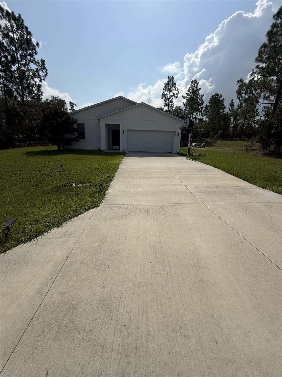 Photo of 8565 SW 125th Court Road, Dunnellon, FL 34432 (MLS # OM729421)