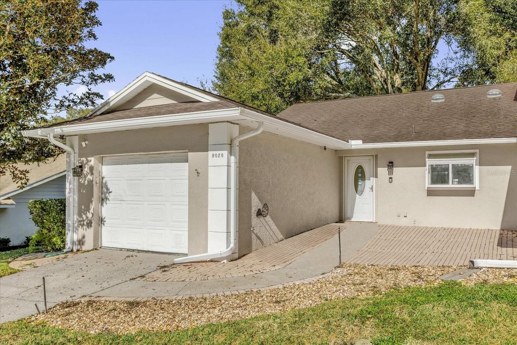 Photo of 9028 Village Green Boulevard, Clermont, FL 34711 (MLS # O6375525)