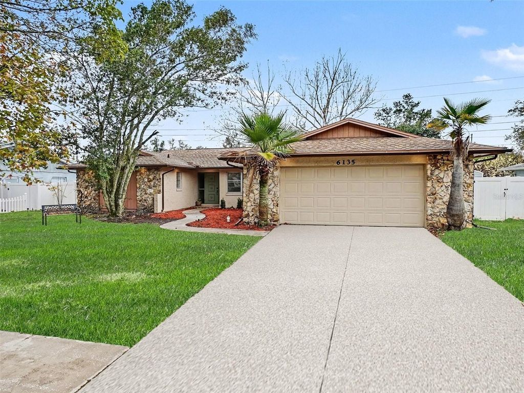 Photo of 6135 Hardrock Circle, Orlando, FL 32819 (MLS # O6381422)