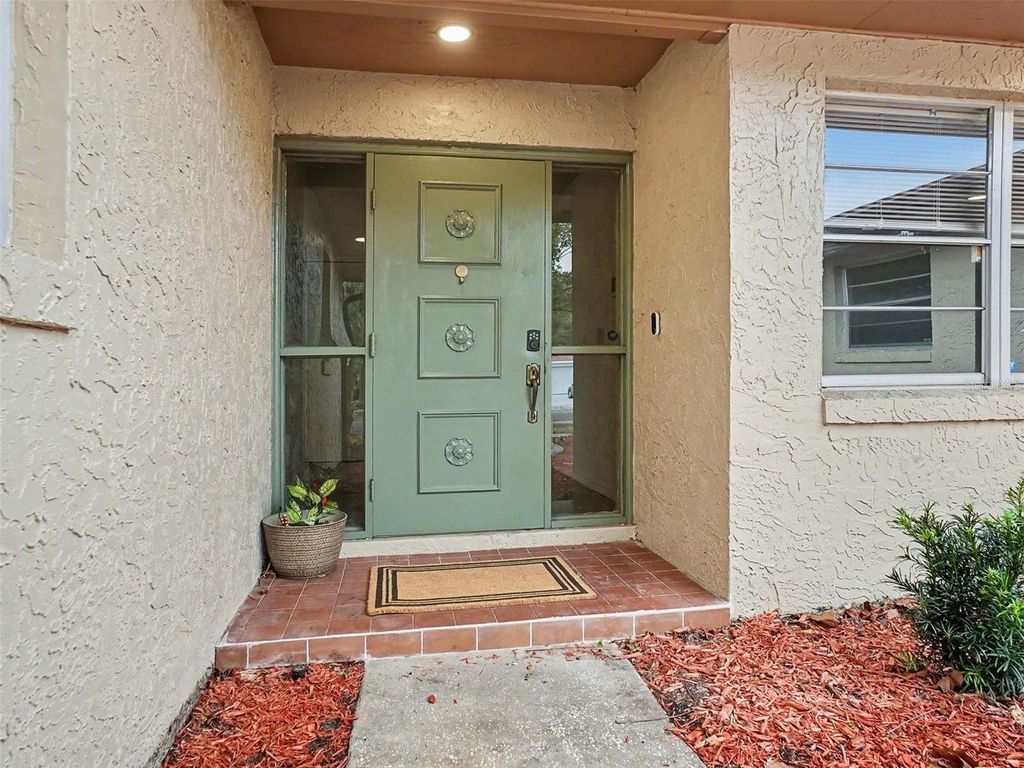 Photo of 6135 Hardrock Circle, Orlando, FL 32819 (MLS # O6381422)