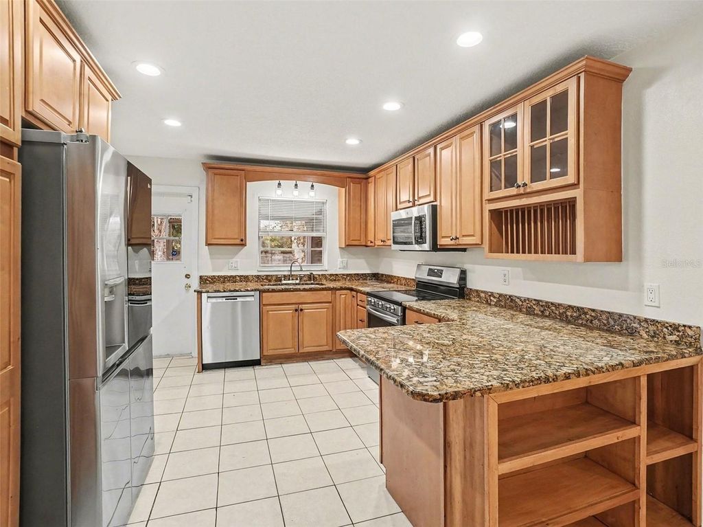 Photo of 6135 Hardrock Circle, Orlando, FL 32819 (MLS # O6381422)