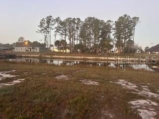 Photo of 9 Avocado Drive, Indian Lake Estates, FL 33855 (MLS # TB8554794)