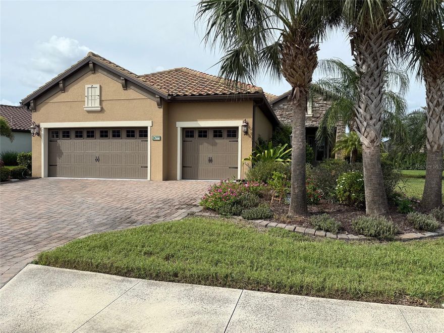 This is the house you have been waiting for! Located in Boca Royale, this luxurious home sits on an oversized lot and offers one of the most expansive water views for your pleasure. With 3 spacious bedrooms, 2 baths, a den, and a 300 sq ft All-Season Room overlooking the water, it is truly a private oasis. The modern kitchen features pull-outs in the cabinets, attractive Quartz countertops, a walk-in pantry, under-cabinet lighting, a custom backsplash, and a Brazilian granite island with ample room for seating. The Great Room is accentuated by crown molding tracing the lines of the tray ceiling and includes a ceiling fan, while the dining room is large enough for a rectangular table to seat eight, illuminated by a beautiful crystal chandelier. The generous office/den is separated from the Great Room by French doors to provide privacy, and the primary bedroom offers a large ceiling fan with a custom solid oak barn door leading to the bathroom, which features quartz countertops and a Riverstone floor in the Roman shower. The landscaping is spectacular with eight palm trees thoughtfully planted for privacy in both the front and back yards, and the backyard showcases special grass planted by the homeowner for a lush look. An underground sprinkler system services both yards, and all flower beds are equipped with a drip watering system. The three-car garage provides extra shelving for storage and includes a sink. Residents of Boca Royale enjoy access to a resort-style pool and clubhouse, a newly renovated championship golf course, tennis and pickleball courts, and a state-of-the-art fitness center, all within a welcoming gated community spread across 1,000 acres of oak trees and nature preserves—a breathtaking backdrop for relaxation and recreation. At the heart of the community is the Georgian-style clubhouse, offering fine and casual dining alongside an active calendar filled with wine dinners, trivia nights, and themed events for easy socializing. Walking and biking trails, a dog park, and outdoor recreation areas invite residents to enjoy the fresh air, while Manasota Key’s white sand beaches, Venice Island’s boutiques and restaurants, and the shops and entertainment of Wellen Park are just minutes away. With nearby marinas, parks, and everyday conveniences, Boca Royale perfectly blends coastal charm with a vibrant, connected lifestyle, making it the ideal place to call home. CALL TODAY FOR A SHOWING!