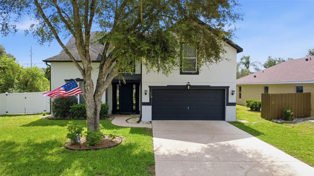 Photo of 609 Rhodes Drive, Deland, FL 32720 (MLS # V4950068)