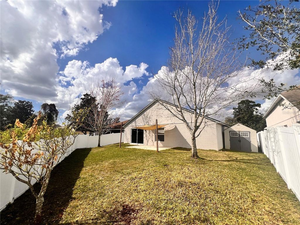 Photo of 3930 Lakeside Reserve Lane, Orlando, FL 32810 (MLS # O6388015)