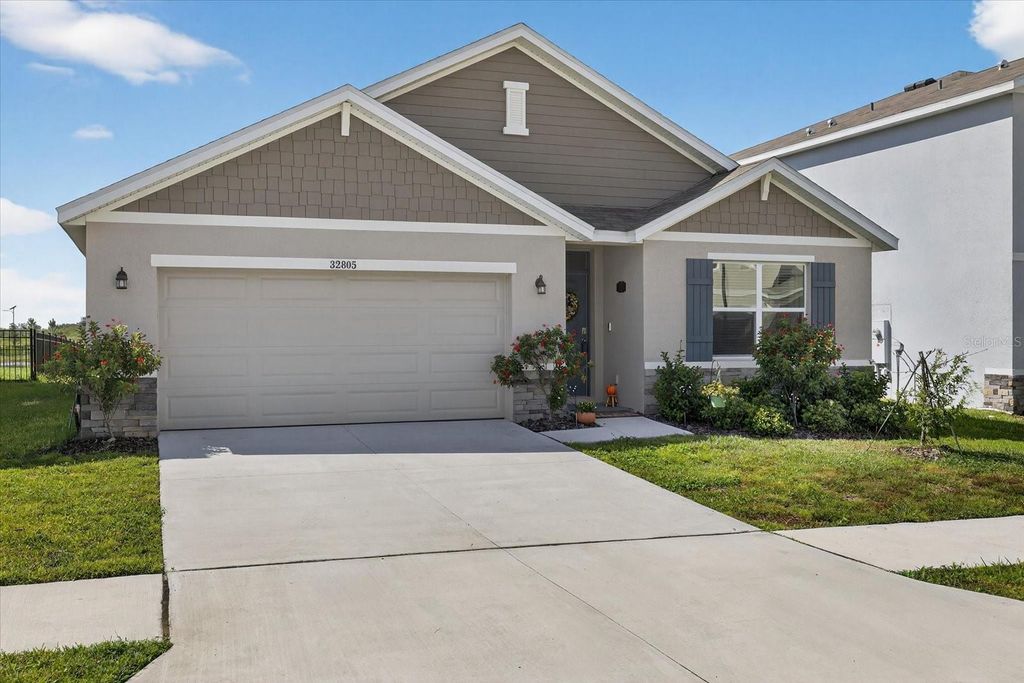 Photo of 32805 Osprey Peak Way, San Antonio, FL 33576 (MLS # TB8434777)