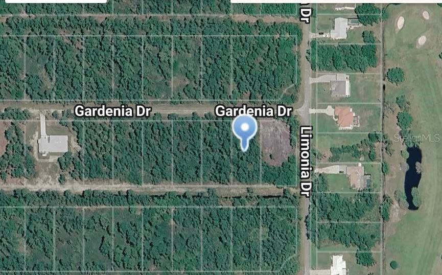 Photo of 203 Gardenia Drive, Indian Lake Estates, FL 33855 (MLS # O6438255)