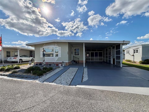 Photo of 120 Camellia Trail, Leesburg, FL 34748 (MLS # G5119312)
