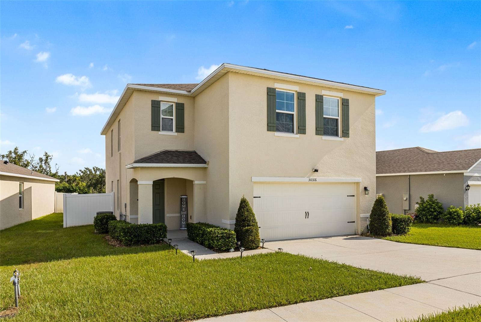 Fully Fenced Backyard Overlooking Flat Island Preserve! Modern Living Surrounded by Nature in Lake Denham. Discover this 2022-built gem in the heart of Lake Denham, where contemporary design meets everyday comfort. Step inside and be welcomed by a bright, open-concept layout, enhanced by large windows that fill the space with natural light. The gourmet kitchen is a true centerpiece—featuring stainless steel appliances, a walk-in pantry, and generous prep space for cooking, hosting, and gathering. The downstairs Great Room offers plenty of room for entertaining guests, with space for a large dining table and a convenient half bath. Upstairs, you’ll find four spacious bedrooms, two full bathrooms, and a versatile loft—perfect for a home office, media space, or play area. Step outside to your private retreat: a fully fenced backyard with peaceful Flat Island Preserve views, ideal for BBQs, playtime with pets, or simply soaking in the Florida sunshine.
Enjoy Lake Denham’s resort-style amenities, including a sparkling pool, outdoor fitness park, playground, and sidewalk-lined streets for walking or biking. This home is designed for today’s lifestyle and offers both style and serenity. Schedule your private tour today and experience Lake Denham living!