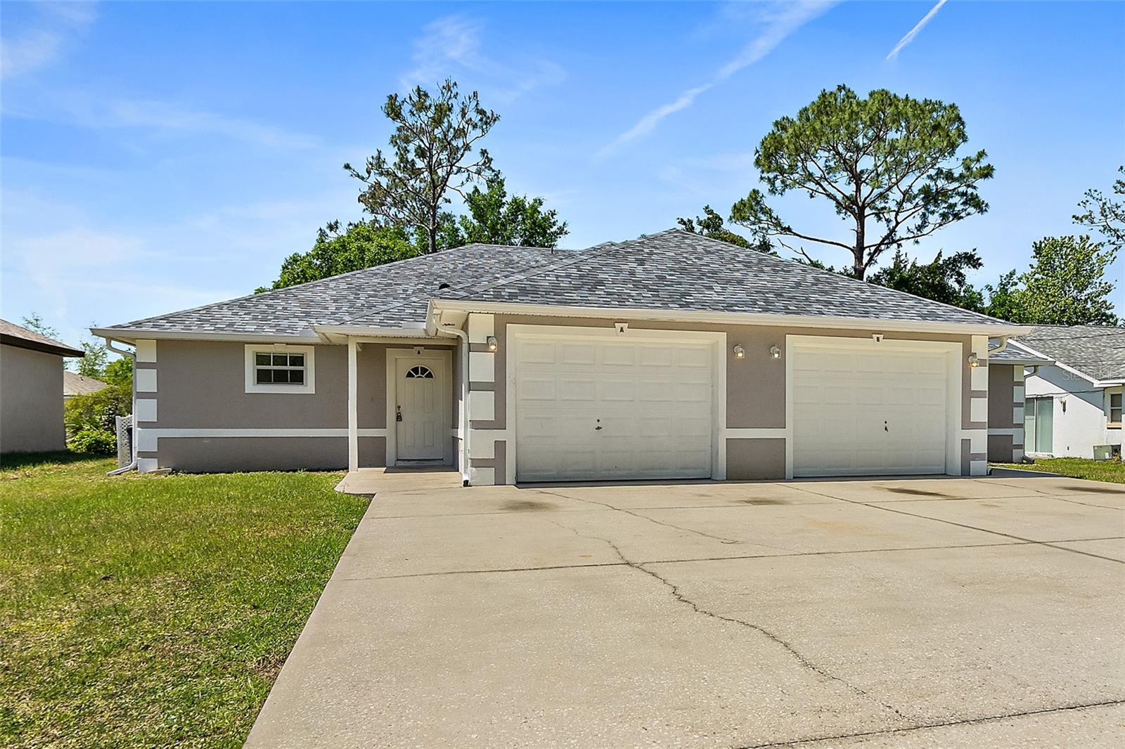 Welcome to the Spacious 3 Bedroom 2 Bath 1 Car Duplex in Pine Grove, located in the beautiful Palm Coast, FL. This home boasts three generously sized bedrooms and two full bathrooms, providing ample space for comfortable living. The property is equipped with a garage door opener for easy access and convenience. A newer A/C unit, helps to ensure a comfortable atmosphere throughout the year. The open patio is perfect for enjoying the Florida sunshine, while the vaulted ceilings add a touch of elegance and spaciousness to the home. The entire house is adorned with tile flooring, offering a sleek and modern look. This duplex is not just a house, but a place you can truly call home. (Side B is also available for Rent)
1st months rent of $1850.00, Security deposit of $1850.00, screening fee $50.00 per 18 year old and over, lease prep of $50.00