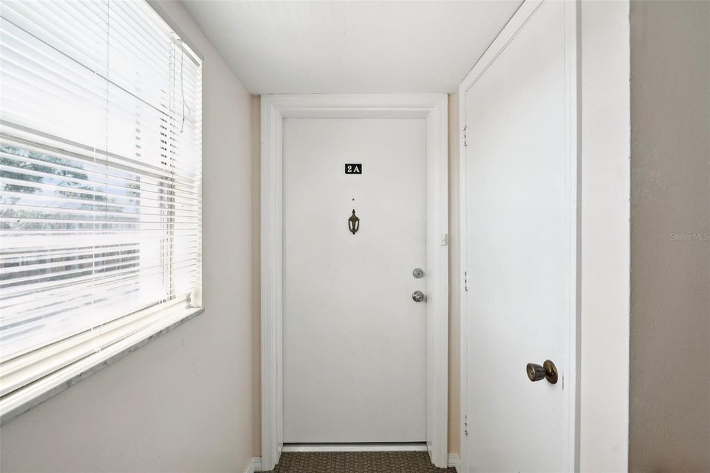 Photo of 1115 Rue Des Chateaux #2A, South Pasadena, FL 33707 (MLS # TB8509010)