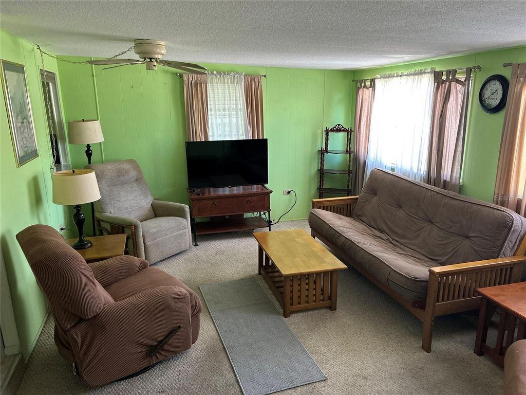 Photo of 11740 Hickory Lane, Tavares, FL 32778 (MLS # O6345849)