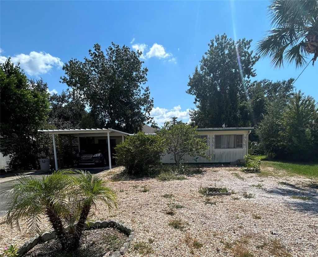 Photo of 11740 Hickory Lane, Tavares, FL 32778 (MLS # O6345849)