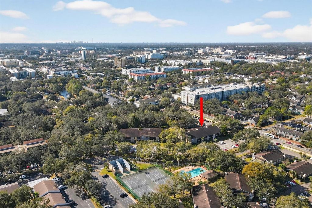 Photo of 4207 Winding Moss Trail #104, Tampa, FL 33613 (MLS # TB8466675)