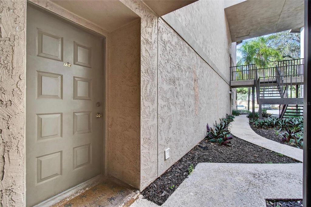 Photo of 4207 Winding Moss Trail #104, Tampa, FL 33613 (MLS # TB8466675)