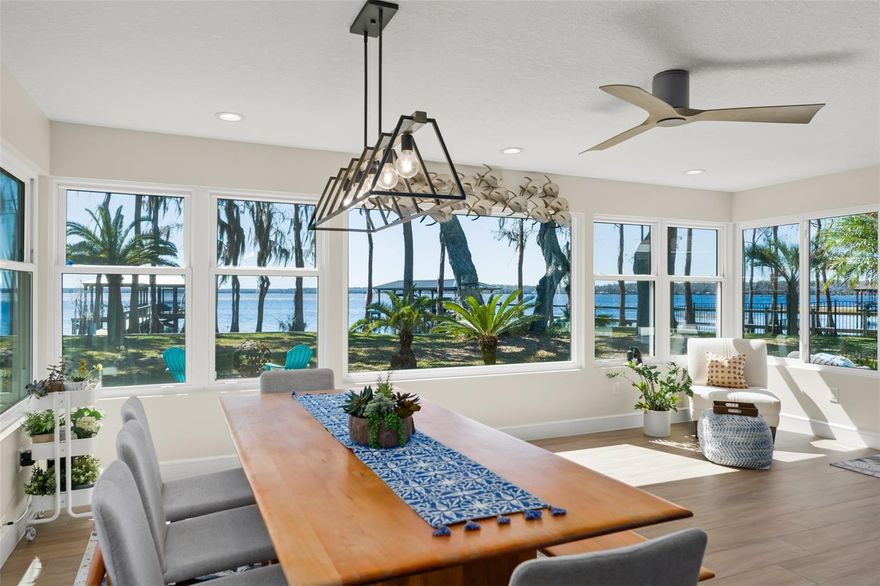 Experience true lakefront living on the Clermont Chain of Lakes with this beautifully remodeled home on the shores of Lake Louisa. Situated on over ½ acre with approximately 116 feet of direct lake frontage, this property offers breathtaking wide-water views, unforgettable sunsets, and the ultimate Florida waterfront lifestyle.

Extensively updated throughout, the home features a bright open-concept floor plan designed to maximize natural light and lake views from the main living areas. The spacious layout includes 4 bedrooms and 3 full bathrooms, highlighted by two primary suites—one on each level— providing ideal flexibility for guests, extended family, or a private upstairs retreat overlooking the water.

Step outside and the property truly shines. The expansive backyard opens to sweeping lake views and direct access to one of Central Florida’s most sought-after boating chains. A private screened dock and boathouse with lift (2022) make it easy to enjoy boating, fishing, and water sports right from your backyard. The addition of a new seawall (2024) enhances both the beauty and longevity of the waterfront.

With its complete interior remodel, prime Lake Louisa frontage, and exceptional outdoor living, this property offers a rare opportunity to enjoy resort-style lake living just minutes from downtown Clermont, dining, and shopping.