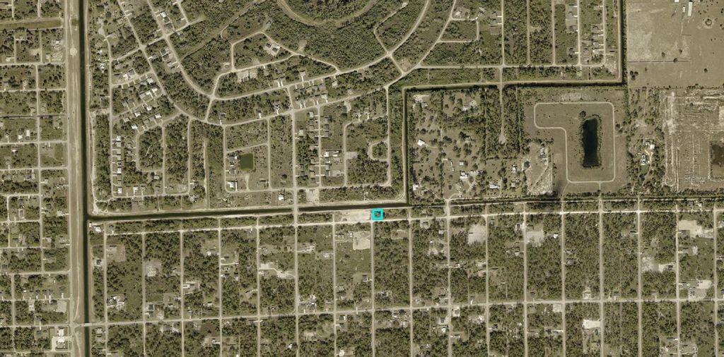 Photo of 1406 W 18th Street, Lehigh Acres, FL 33972 (MLS # A4693199)