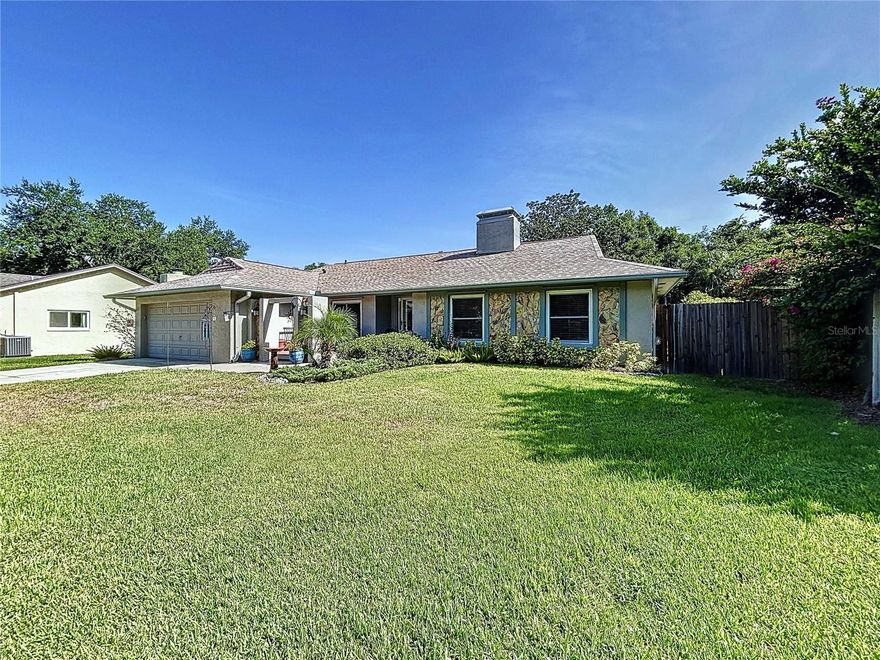 **There was NO FLOOD DAMAGE to this home from last year's storm Milton nor has it ever Flooded.** If a country setting with city conveniences is what you desire, this Charming, move-in ready, one level Single Family Pool Home is a must see! This 4 bedroom, 2 bath home is situated on a beautiful .26 acre premium cul-de-sac home site in the quiet, highly desirable Tampa/Carrollwood community of Country Place; an idyllic, Low-HOA, non-CDD community conveniently positioned near shopping, restaurants & major interstates. The easy and natural flow of this charming Westbrook built, Monarch floor plan makes the spaciousness of this 1,815 square foot casual yet elegant home feels even grander. The interior boasts an open floor plan, a nice sized family room measuring approximately 14X19 with a wood burning fireplace and sliding doors that exit to the lanai, high ceilings, split bedroom plan, formal living room, formal dining area, skylights, inside laundry room w/large custom cabinets & laundry sink, front entry door w/stained glass allowing ample natural light, window blinds, a warm color pallet, whole house water filtration system, neutral tile in wet areas & luxury vinyl wood flooring flow throughout the home. The kitchen has ample cabinet and counter space, Quartz countertops, tile backsplash, brushed nickel cabinet hardware, breakfast bar, large walk-in pantry, reverse osmosis system & stainless appliances. The primary bedroom is 13x17, with a large walk in closet. The en suite bath has double bowl vanity w/granite countertop, upgraded light fixture & faucets & step in XL shower w/earth tone tile. The 2 car garage also includes several desirable upgrades such as an upgraded garage door for storm protection, epoxy floors and a 240V outlet for EV charging. The natural foliage, vegetation and mature trees provide a peaceful backdrop for your private in ground pool; the covered & screened lanai with ample under roof seating space overlooking the pool offers the perfect setting for family gatherings, entertaining or to simply relax. Don't be fooled by this rural setting as it is conveniently located just minutes from everything you may need. No CDD Fee and a Low HOA fee of  $12.50 a month which makes this community even more desirable! This awesome home offers a plethora of upgrades, to follow are just a few: Roof 2021 with transferable warranty, HVAC 2019, Double Pane Windows, Hurricane Aluminum Window Panels, Upgraded Garage Door (storm protected), Updated Kitchen, New Flattop Electric Range 2024, Updated Bathrooms, Newly Replaced Interior Doors, Luxury Vinyl Plank Flooring, Energy Efficient Pool Pump, Epoxy Garage Floor & 240 Volt Outlet for EV Charging. ***Buyer of this home will receive a 1% Lender Credit with the use of Jeffrey McCarthy, Mortgage Advisor with NEXA Mortgage**