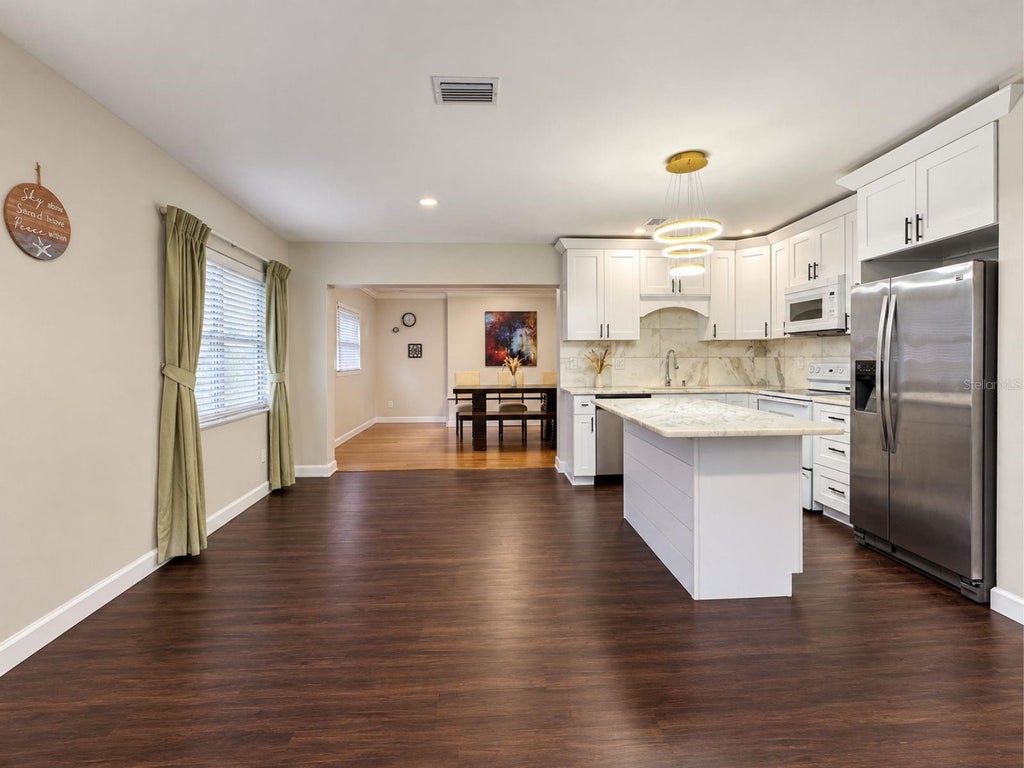 Photo of 7035 Orkney Avenue N, St Petersburg, FL 33709 (MLS # TB8548660)