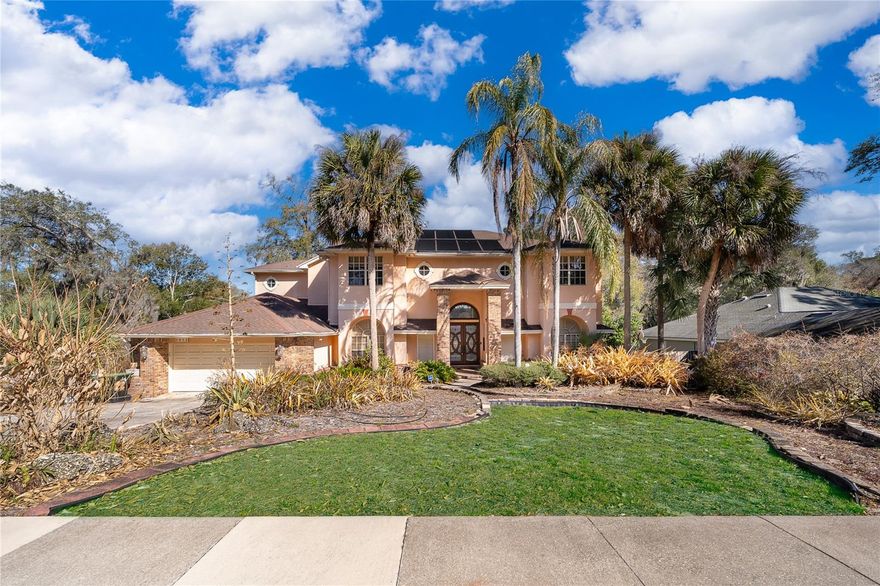 This one-of-a-kind property was thoughtfully designed and built by Dave Brewer Custom Homes and features custom landscaping by the current owner. Enter through stunning 8-foot mahogany and glass double doors into a dramatic space featuring soaring 20-foot ceilings, a striking coral rock fireplace, and breathtaking views of Lake Alma from all main living areas, including two rear balconies spanning the full length of the home. The unique split-bedroom floor plan includes a full en-suite on the main level and three additional bedrooms upstairs. The impressive primary suite offers a wood-burning fireplace, connected den/office with built-ins, cedar-lined walk-in closet, personal laundry chute, and access to the third-floor balcony. The spacious main-level kitchen provides convenient access to the laundry room and garage with pegboard wall storage. The first floor features a large bonus room that opens to the oversized pool area with recently replaced pump, filter, and overflow hose, along with deck access to a climate-controlled wine cellar with its own AC unit and a separate workshop/storage space. Designed for entertaining, the home also includes a water filtration and softener system and 5 year old well maintained AC unit.