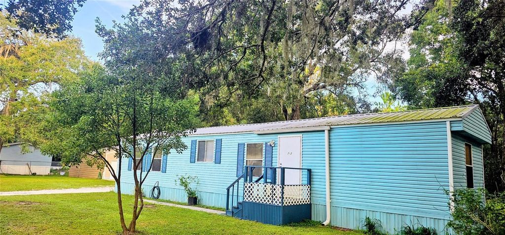 Photo of 312 Donald Lane, Winter Haven, FL 33880 (MLS # O6342130)